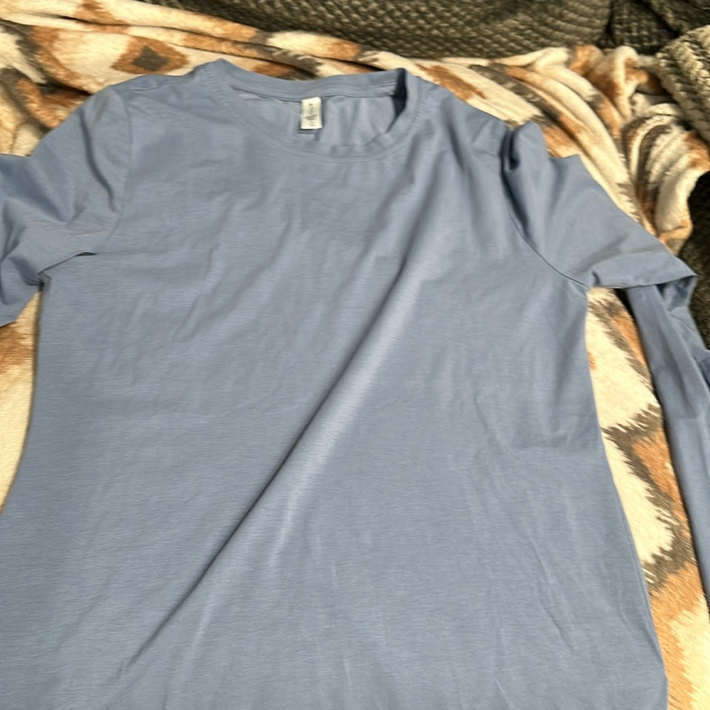 Athleta momentum seamless top long sleeve. Blue star. Size small